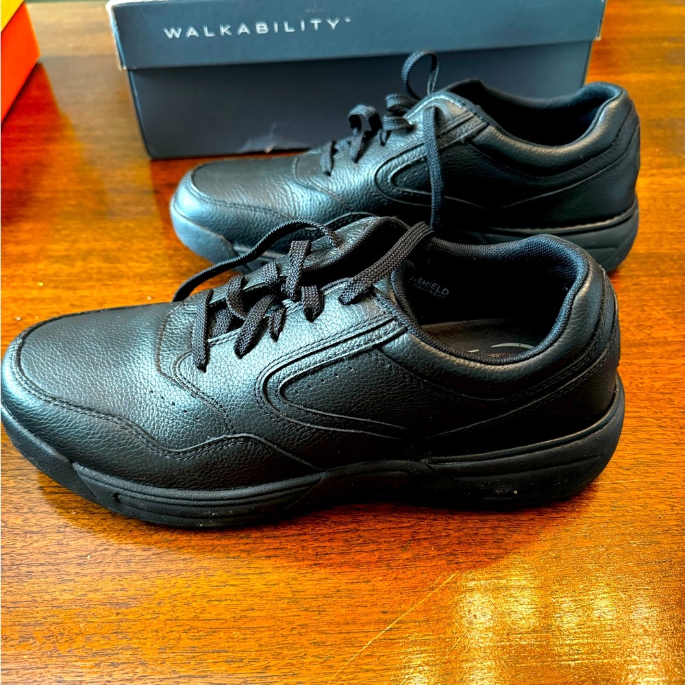 Men’s Rockport black waterproof shoes. Brand new-never worn. Size 11.5.